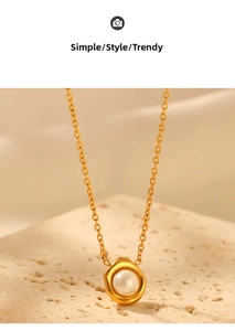 Macro detail of a white pearl necklace set in an irregular gold metal frame pendant
