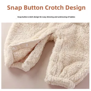 Detail of baby plush romper snap closure on crotch for easy diaper changes