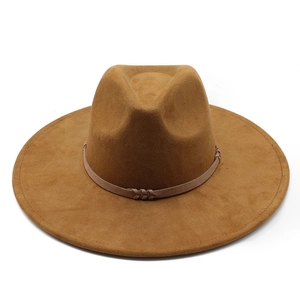 Close-up of deep brown wool felt fedora featuring a classic woven decorative band