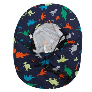 Detail of kids sun hat with neck flap and colorful dinosaur print on blue fabric