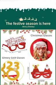 Detail of Christmas and New Year glitter glasses with 2026 and Happy New Year motifs