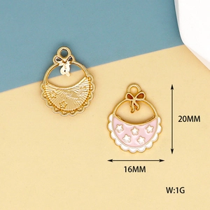 Detailed view of pink and white enamel baby bib charms with dimensions 20x16mm