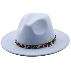 Detailed view of light blue fedora hat with leopard print band and golden buckle
