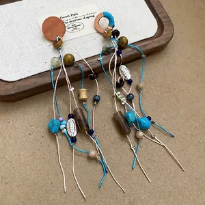 Bohemian geometric long tassel earrings with wood beads and turquoise stones for women