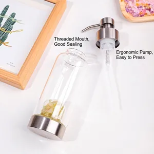 Glass lotion dispenser with natural citrine crystals and durable stainless steel pump