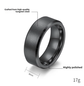 Macro detail of 8mm matte brushed black tungsten steel ring with polished edges