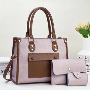Three-piece purple tote bag set with textured faux leather and gold stud accents