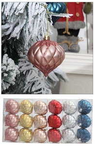 Macro detail of assorted electroplated Christmas ball ornaments in 24-piece box set