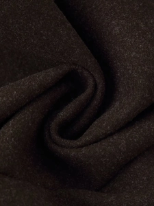 Detailed texture of dark brown wool fabric showing fine fibers and natural soft folds