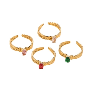 Set of four gold stainless steel adjustable rings with colorful oval zircon gemstones