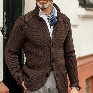 Close-up of dark brown waffle knit cardigan showing fabric texture and button detail