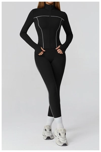 Detail of thumb hole cuffs and white trim on slim fit athletic yoga jacket for women