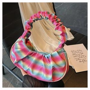 Detail showing gradient rainbow pleated satin cloud bag with a single top handle