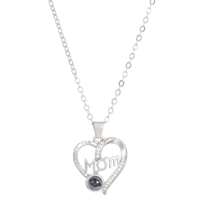 Detail of silver heart necklace featuring MOM engraving and crystal stone accents
