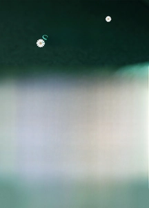 Macro shot of an adjustable s925 silver chain ring with a mint green rectangle gemstone