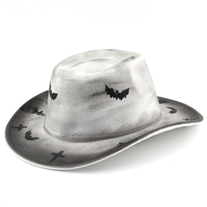 Distressed Halloween cowboy hat with black bat and cross patterns on white background