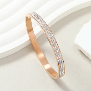 Rose gold titanium steel bracelet featuring three rows of sparkling inlaid crystals