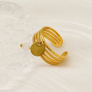 Detail of multi-layer 18K gold-plated ring with natural stone and adjustable opening