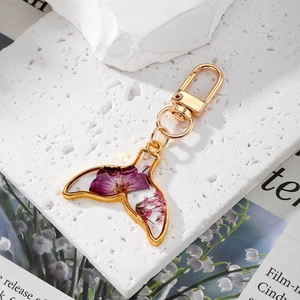 Handmade resin mermaid tail keychain with real purple dried flowers and gold clasp