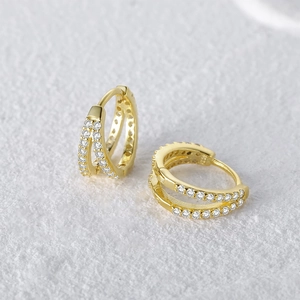 Detailed side view of S925 sterling silver gold earrings with double rows of zircon crystals