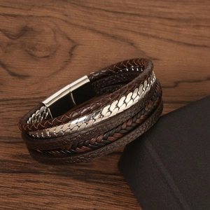Detailed view of brown multilayer leather bracelet with silver chain and magnetic clasp