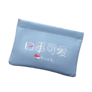 Portable light blue leather makeup pouch with automatic closure and lovely print