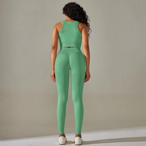 Detailed back view of seamless green yoga set with breathable knit texture and high-waist fit