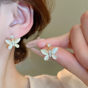 Elegant gold-plated butterfly stud earrings with cat eye stones and sparkling zircons