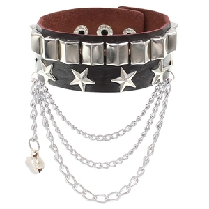 Detail of PU leather punk bracelet with metal studs, stars and layered hanging chains