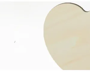 Close-up of heart-shaped wooden plaque showing natural grain and smooth polished edges