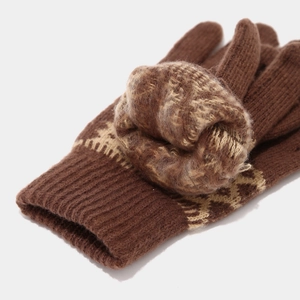 Close-up of brown knit gloves with geometric patterns and thick plush thermal lining
