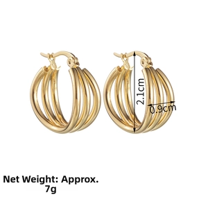 Detailed view of triple-layered golden titanium steel huggie earrings with 2.1cm height