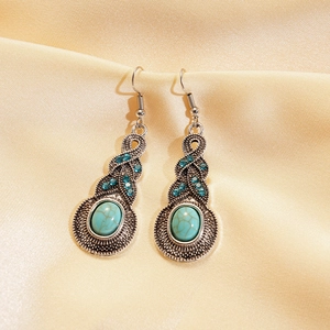 Vintage silver leaf earrings with turquoise oval stones and blue rhinestones on silk