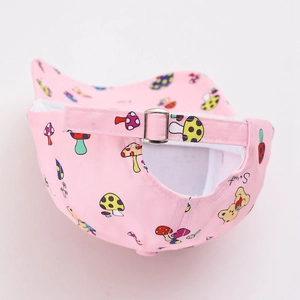 Detail of child pink baseball cap with sweet bear mushroom print and metal buckle