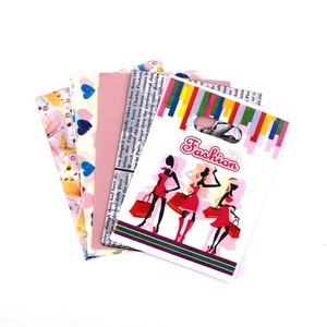 Detail of assorted plastic gift bags with butterfly, heart and fashion character prints
