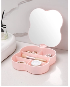 Pink clover jewelry box with makeup mirror and divided compartments for storage