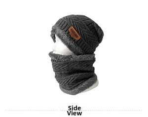 Detail of grey knitted hat and neck warmer set with thick fleece lining and leather label