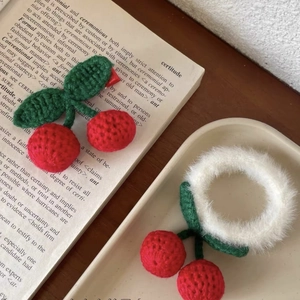 Handmade knitted cherry hair clip and white plush scrunchie set for elegant hair styling
