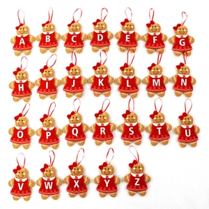 26-piece set of felt gingerbread man ornaments with white A-Z alphabet letters