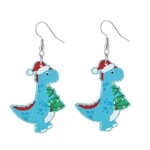Detailed view of blue acrylic dinosaur earrings with festive Christmas hat and tree