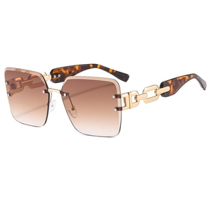 Chic rimless square sunglasses with gradient brown lenses and golden chain temples