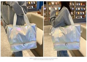 Detail view of large capacity iridescent white travel bag with double layer wet dry separation
