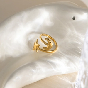 Adjustable 18K gold plated stainless steel ring featuring celestial star and moon motifs