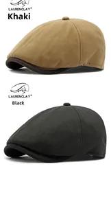 Close-up of herringbone texture on khaki and black warm winter newsboy caps