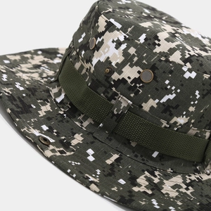 Detail of digital camouflage boonie hat featuring metal air vents and tactical webbing