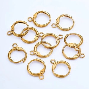 Macro detail of 18K gold plated French hook earrings with round loops for DIY jewelry