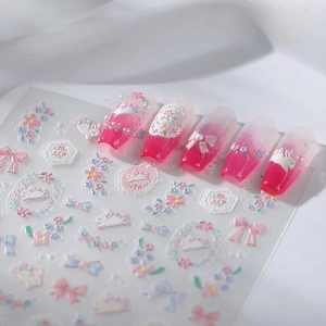 3D floral bow nail art stickers featuring pink rabbits and lace designs for manicures