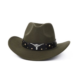 Close-up of olive green wool felt cowboy hat with gold studs and silver bull head emblem