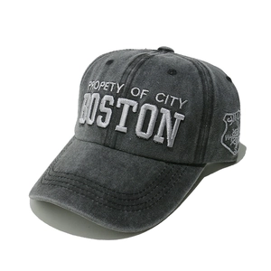 Detail of washed cotton baseball cap featuring vintage BOSTON embroidery and shield patch