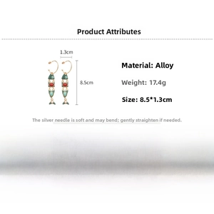 Detail view of long green fish tassel earrings with 8.5cm length and alloy material